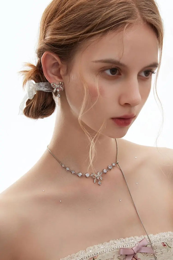 Fibflx Women's Bow Earrings with Glimmer Gem