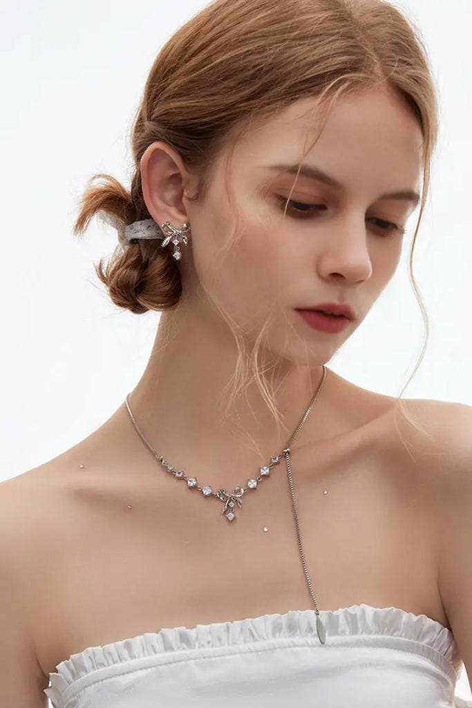 Fibflx Women's Bow Earrings with Glimmer Gem