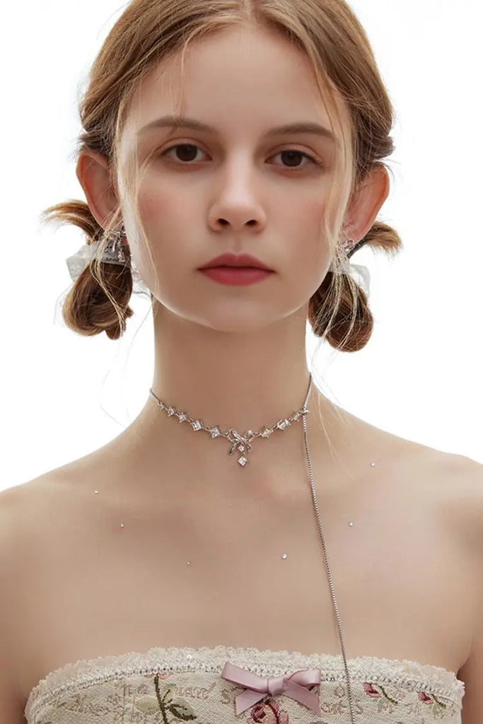 Fibflx Women's Bow Earrings with Glimmer Gem