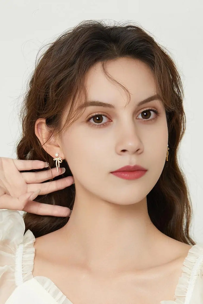 Fibflx Women's Bow Earrings with Pearl and Glimmer Gem