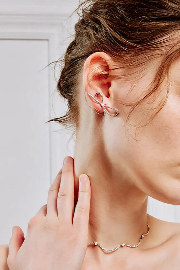 Fibflx Women's Silver Bow Stud Earrings with Glimmer Gem